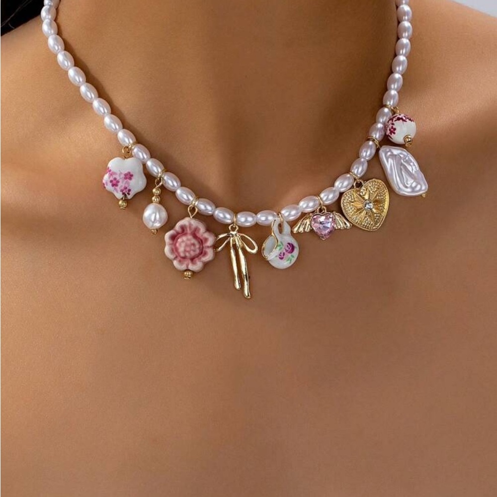 Pink and White Charm Necklace with Vintage-Inspired Design